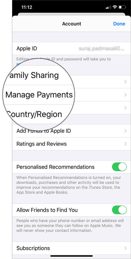 Klicka på Hantera betalningar i App Store -inställningarna på iPhone